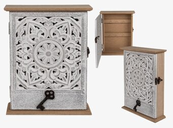 Bild av elegant vitt nyckelskåp med snirklad design