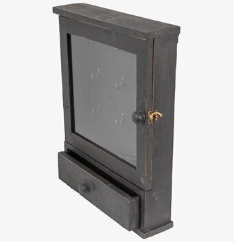 Foto av ett stilrent antiksvart nyckelskåp med glasfönster