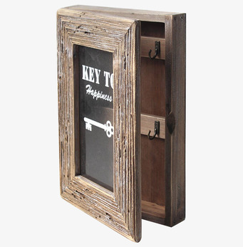 Bild av stilrent nyckelskåp med glas och trädetaljer