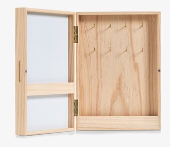 Bild av stilrent nyckelskåp med whiteboard och mässingskrokar